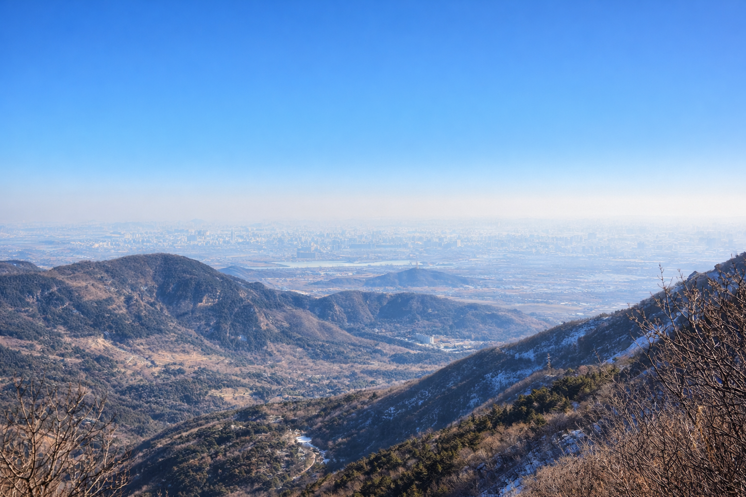 a ChaptGPT image showing the view you can have when you have a Beijing winter hike on Jietai-qianling loop