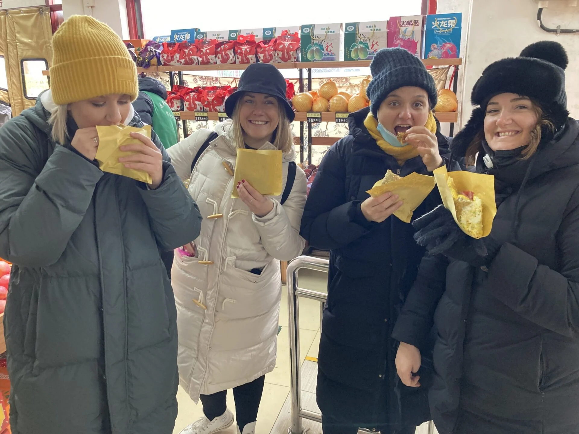 Guests tasting breakfast snacks on our Breakfast in Beijing experience